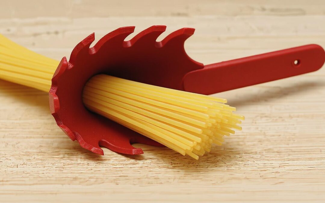 O buraco na concha de espaguete: a função secreta que vai mudar a forma como você cozinha macarrão!